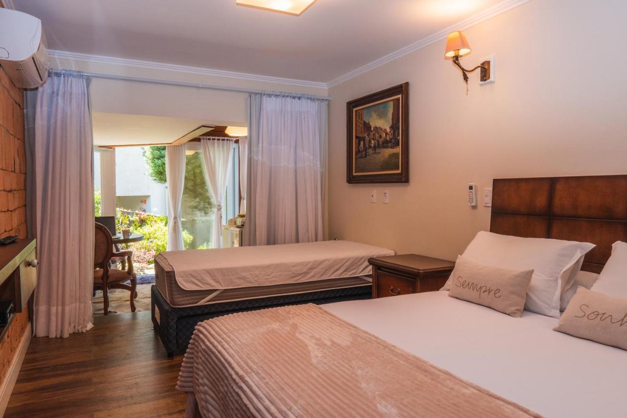 Suites Refugio Do Vale กรามาโด ภายนอก รูปภาพ