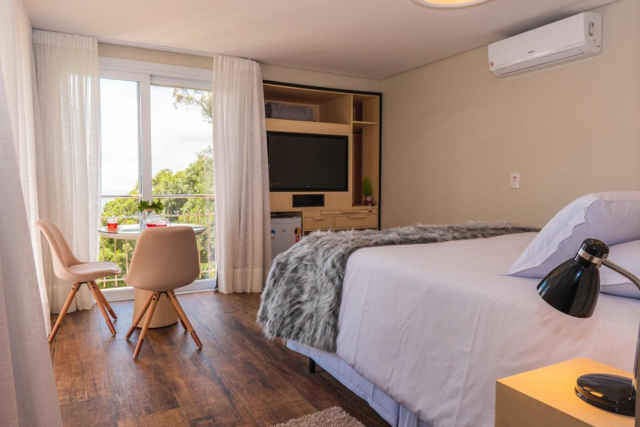 Suites Refugio Do Vale กรามาโด ภายนอก รูปภาพ